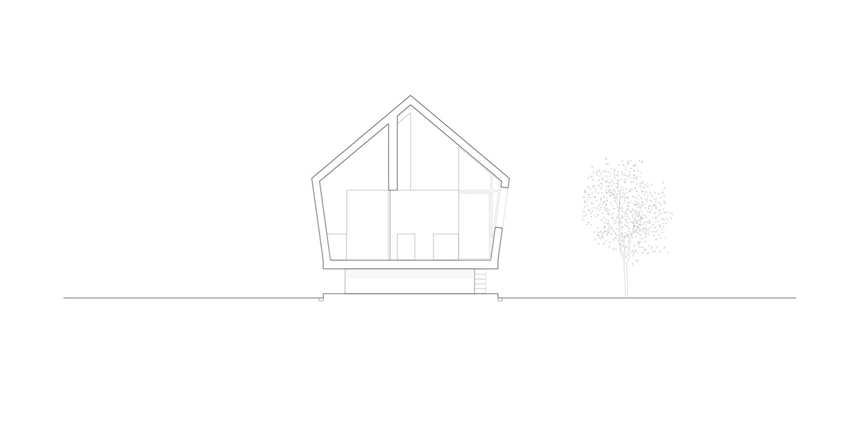 LDA.iMdA architetti associati built modular house raised on stilts in the middle of orchard in Italy