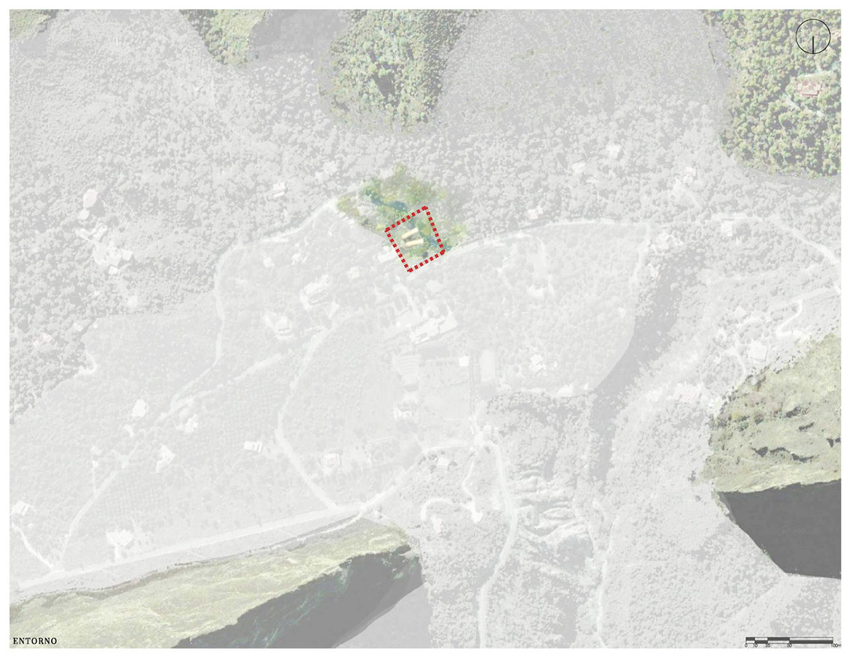 P+0 Arquitectura designs residence mixed with concrete and stone volumes on a complex terrain