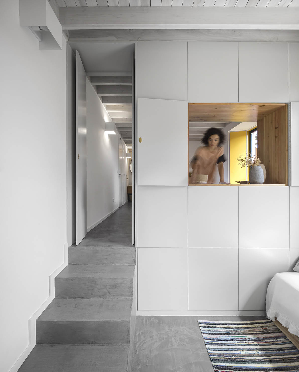 Mezzo Atelier transforms old barn into guesthouses featuring different hues of pink