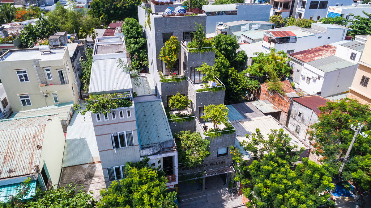 Ho Khue Architects brings jungle life into a terraced apartment building in the Da Nang City, Vietnam