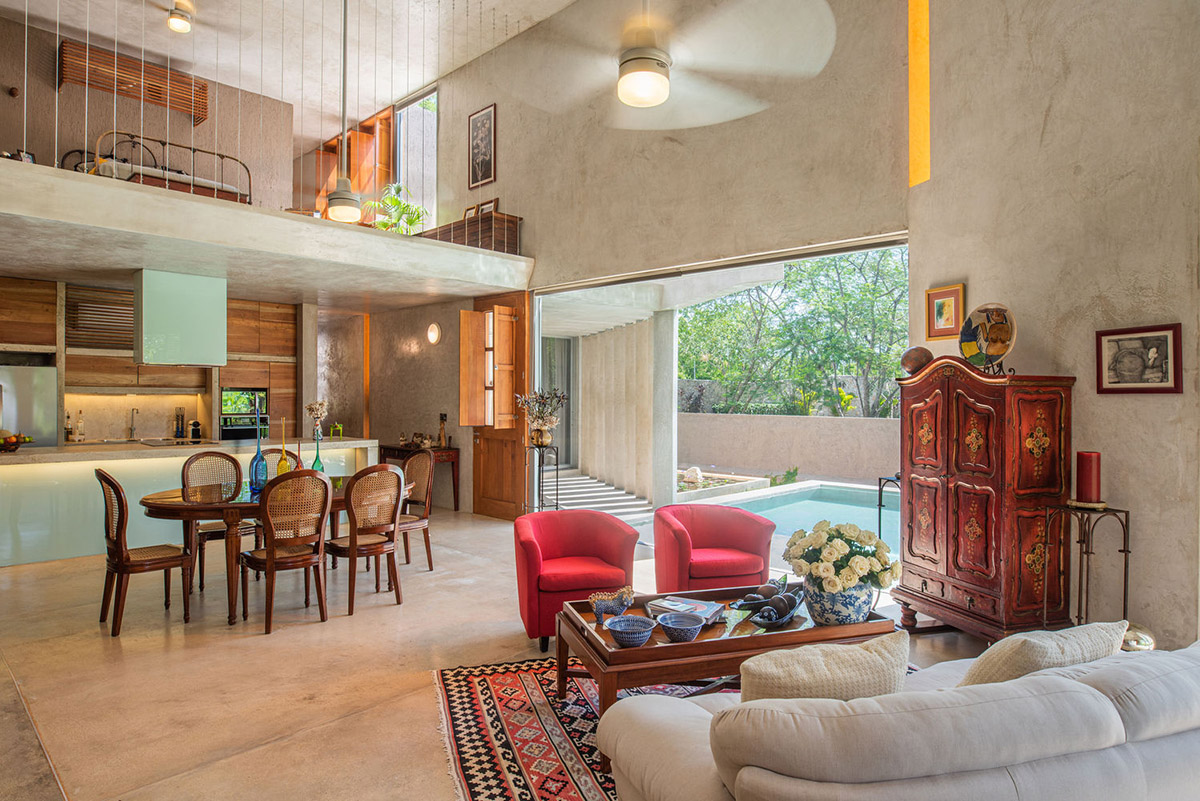 Natural-toned detached house by TACO features dynamic open spaces and backyards in Mexico