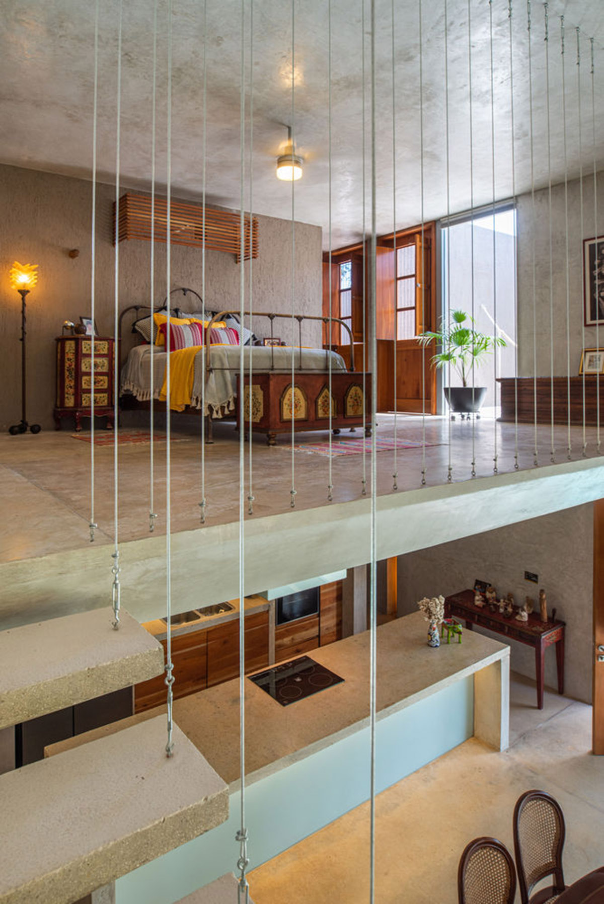 Natural-toned detached house by TACO features dynamic open spaces and backyards in Mexico