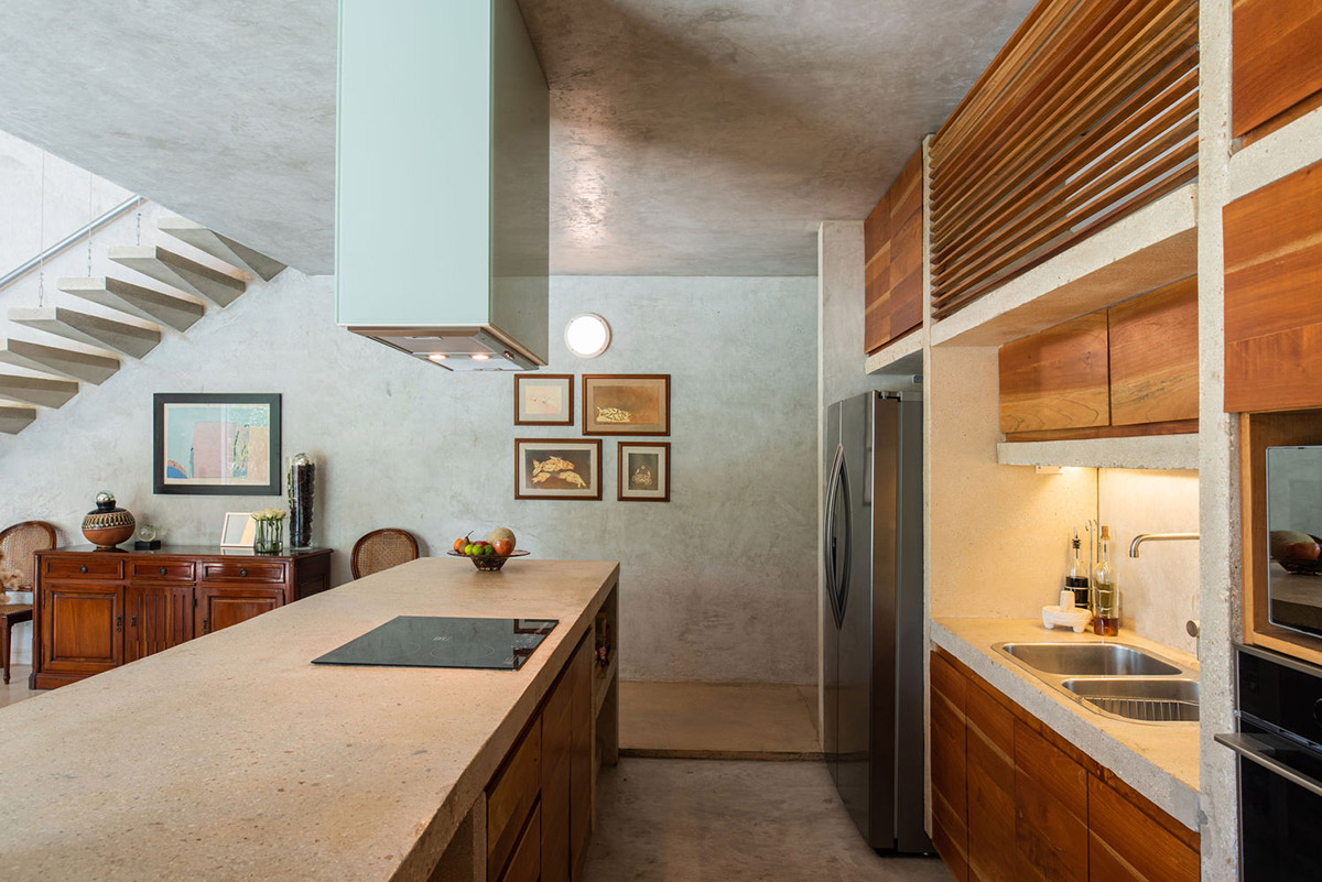 Natural-toned detached house by TACO features dynamic open spaces and backyards in Mexico