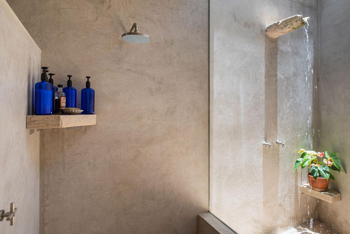 Natural-toned detached house by TACO features dynamic open spaces and backyards in Mexico