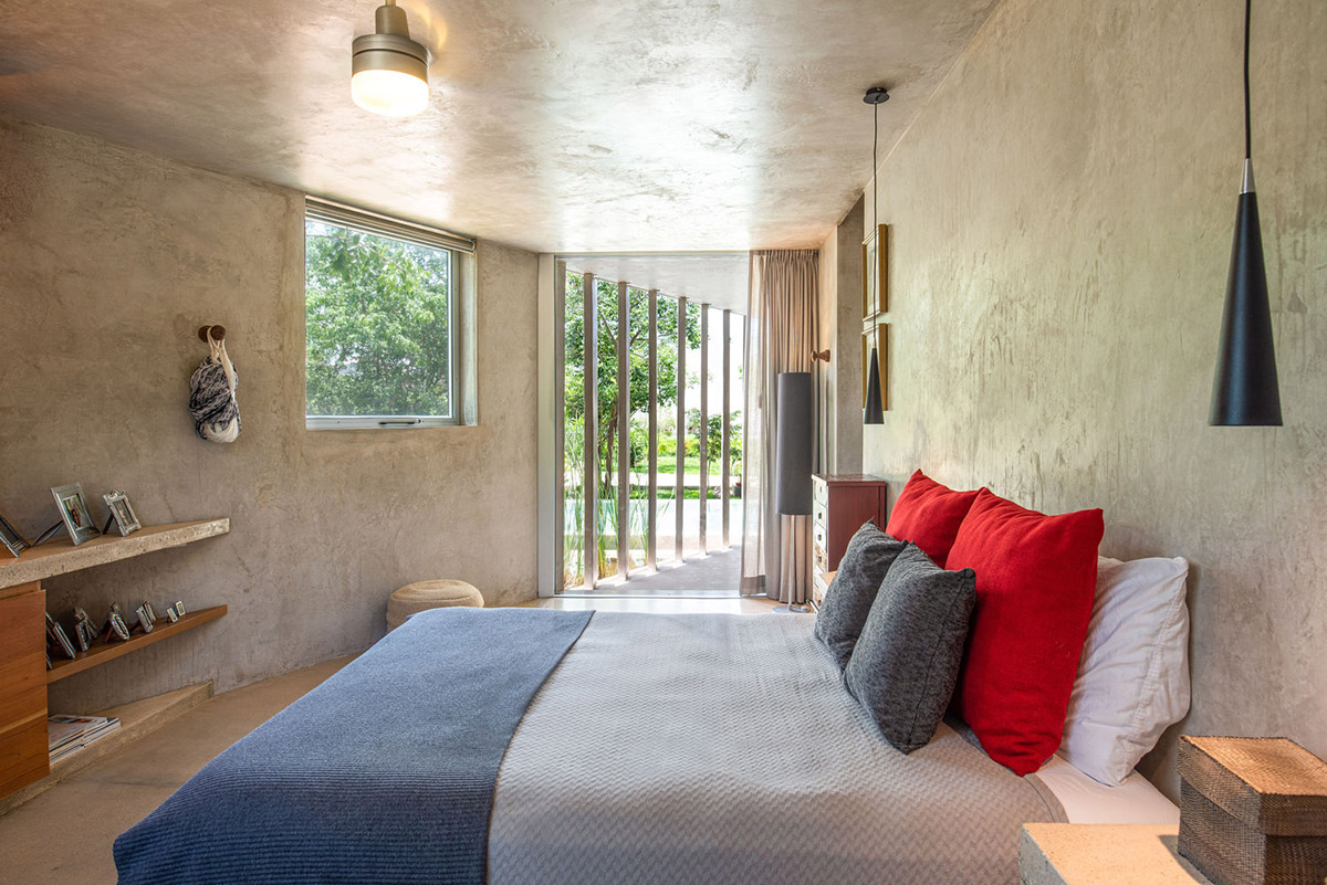 Natural-toned detached house by TACO features dynamic open spaces and backyards in Mexico