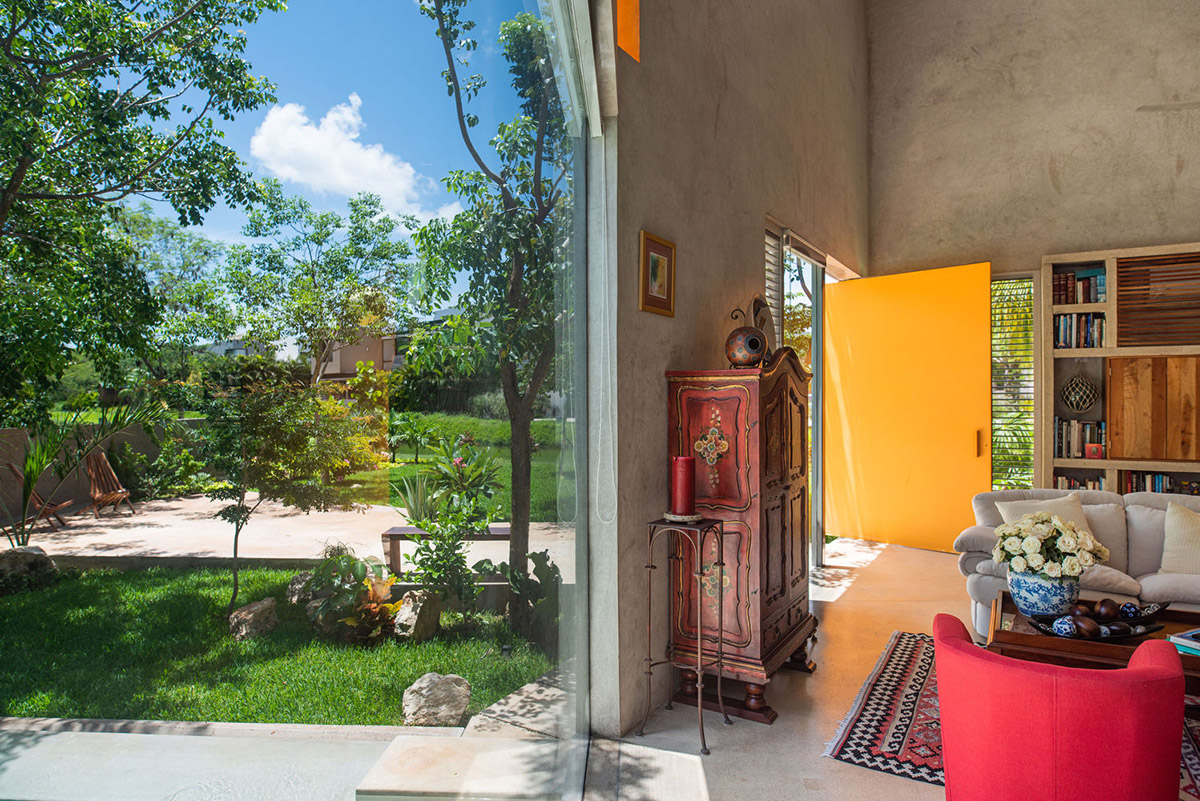 Natural-toned detached house by TACO features dynamic open spaces and backyards in Mexico