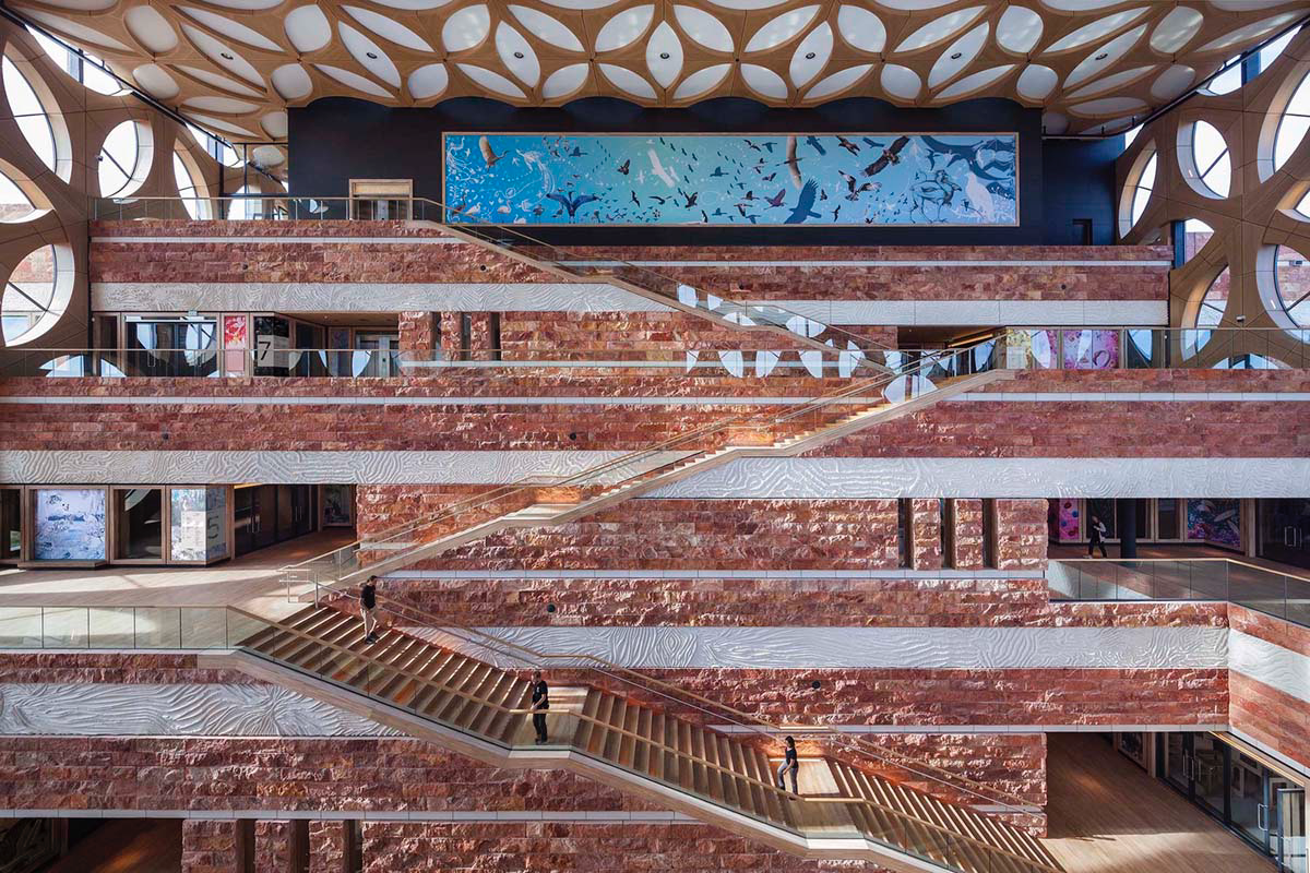 3D concrete patterns are combined with a stack of stone layers for research center in The Netherlands