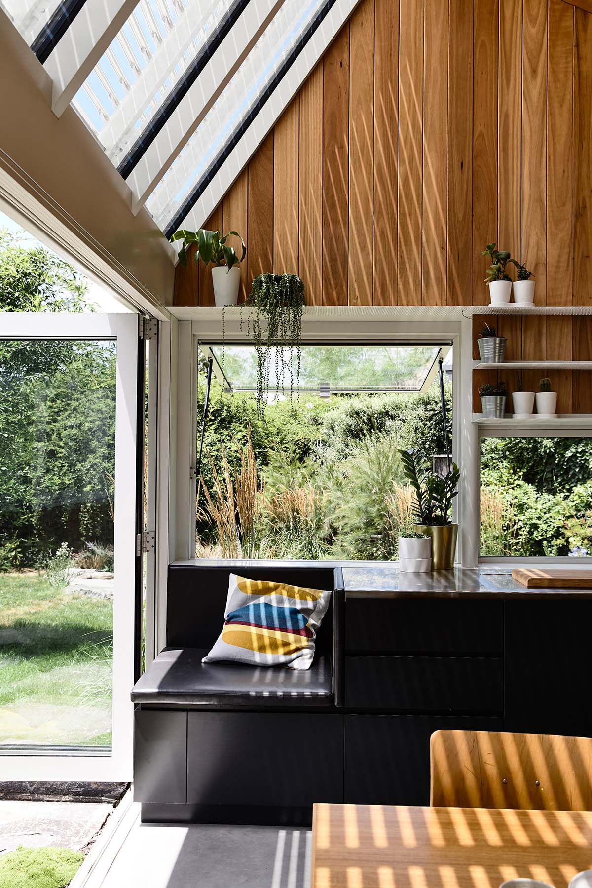 Austin Maynard Architects extends existing post-war Canberra house with two shingle-clad pavilions