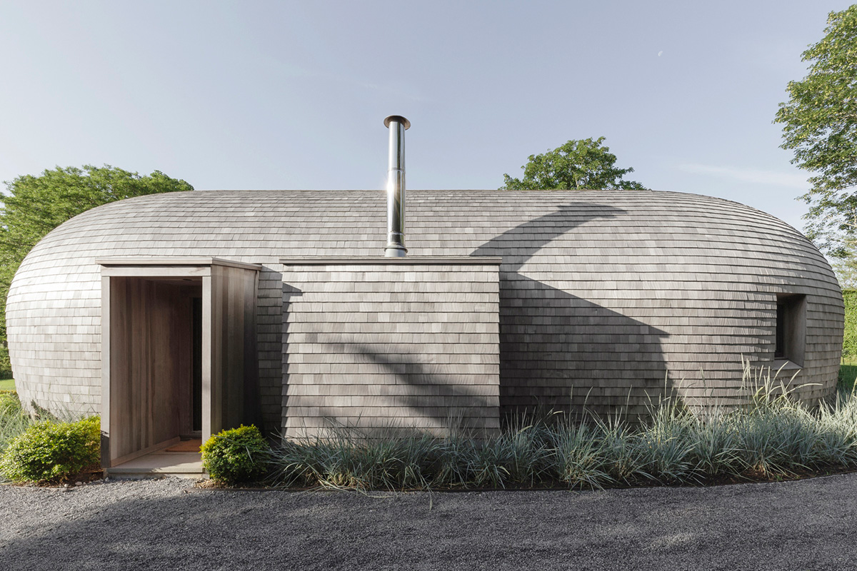 nea studio's cocoon-shaped residence in Long Island acts as a