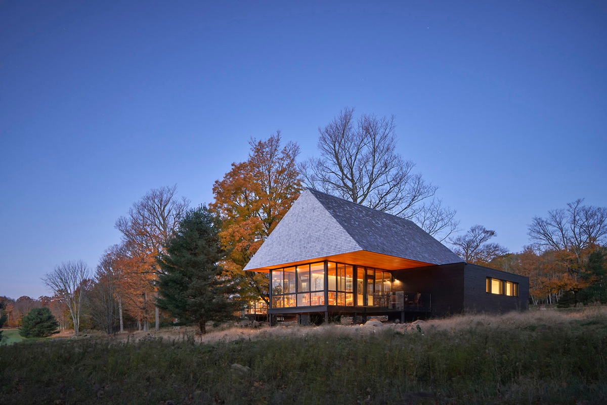 Mackay-Lyons Sweetapple Architects completes island cabins with extruded roofs among pine trees