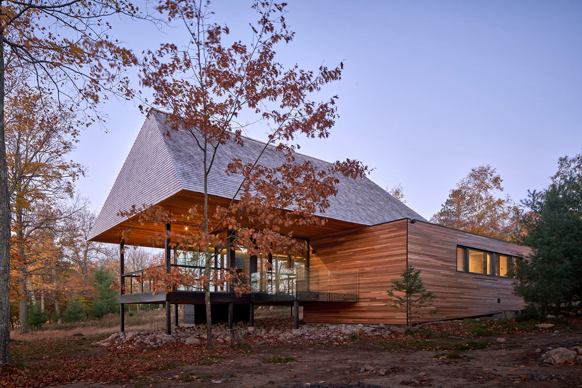 Mackay-Lyons Sweetapple Architects completes island cabins with extruded roofs among pine trees