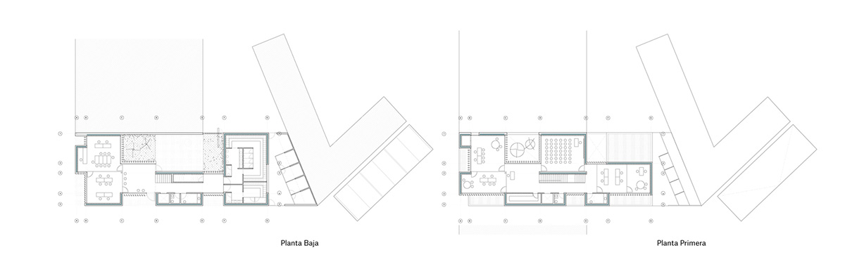 White cubic volumes combined with inward system of patios to create zero-energy Port Operations HQ