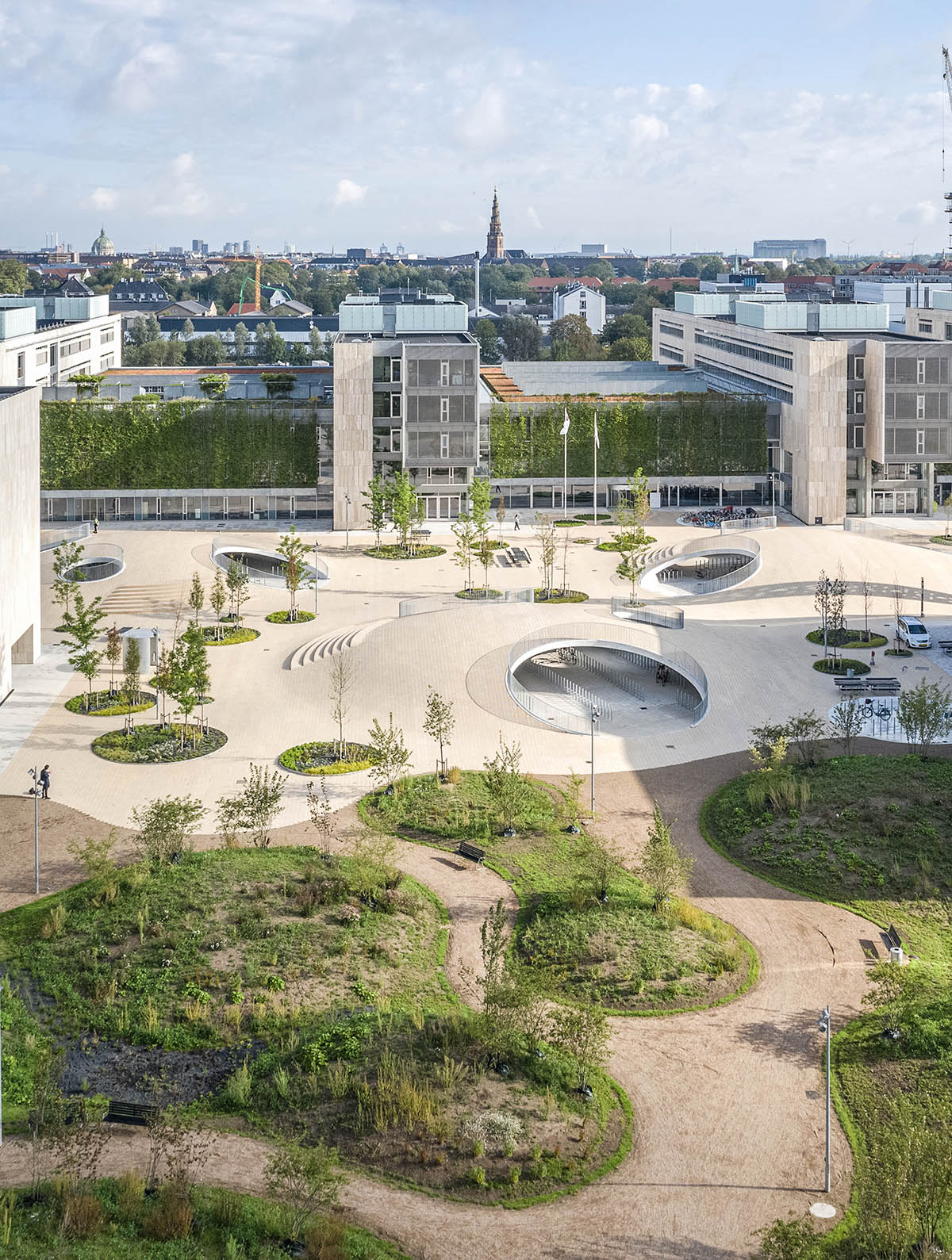 COBE creates undulating landscape with hollow hills for cyclists in Copenhagen