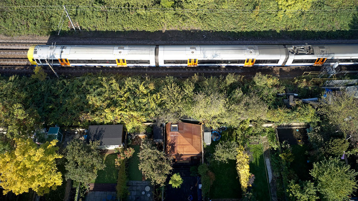 RISE Design Studio built sunken garden studio with rusted steel to provide a hidden place to escape