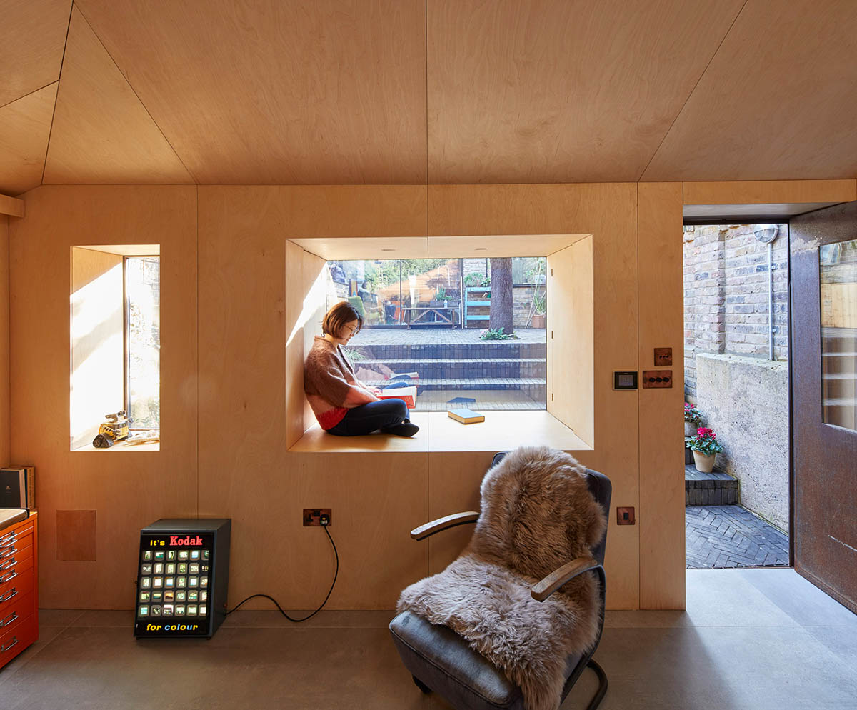 RISE Design Studio built sunken garden studio with rusted steel to provide a hidden place to escape