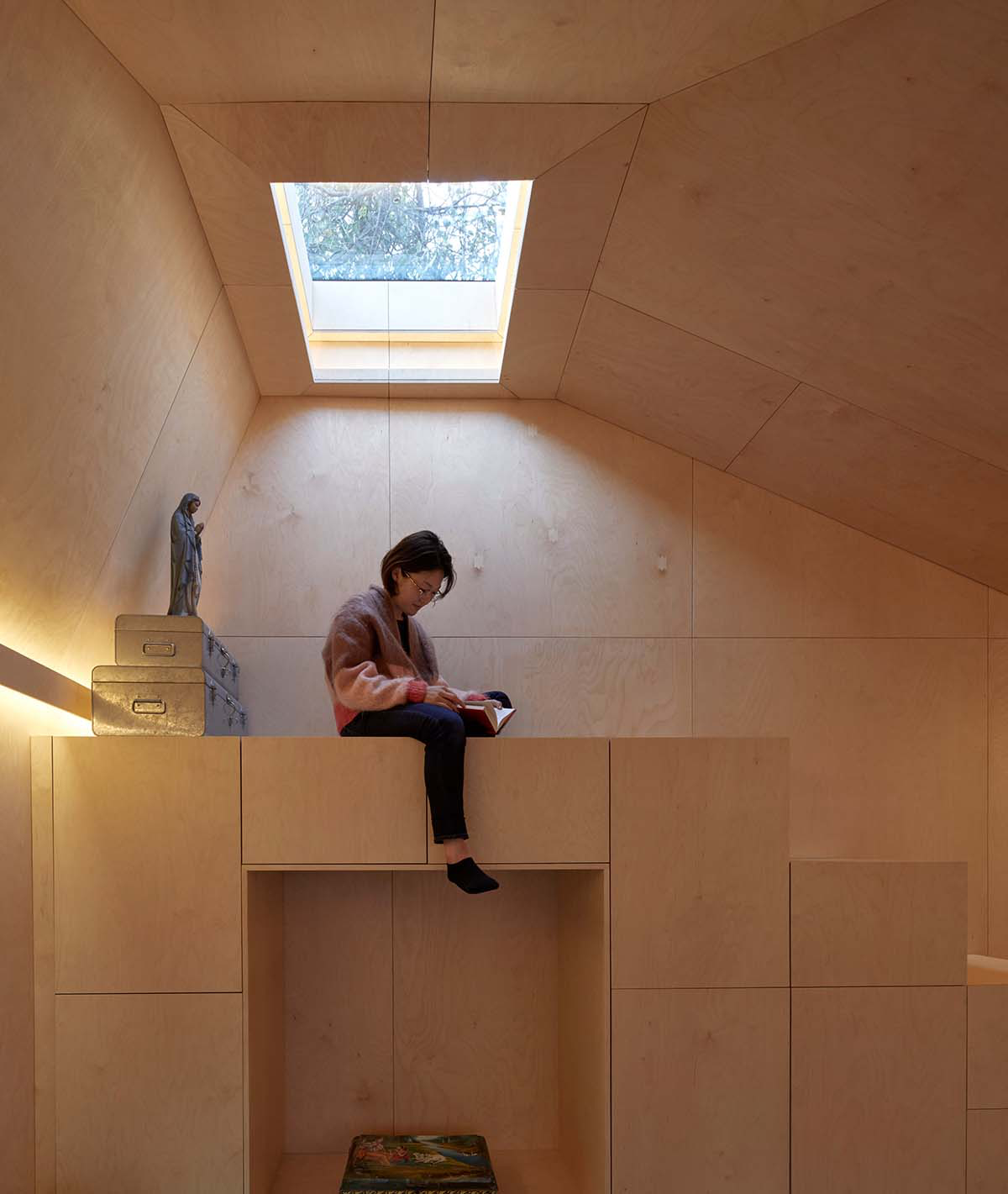 RISE Design Studio built sunken garden studio with rusted steel to provide a hidden place to escape