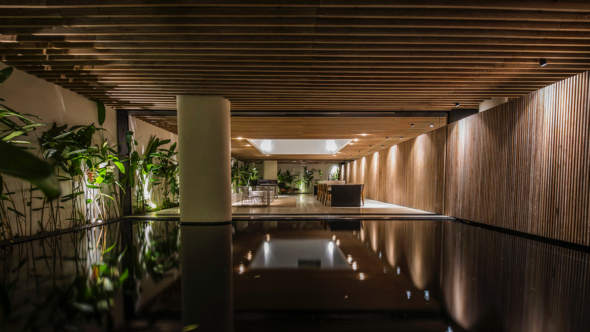 MIA Design Studio compensates the lack of green spaces of Vietnam with planted pop-up balconies