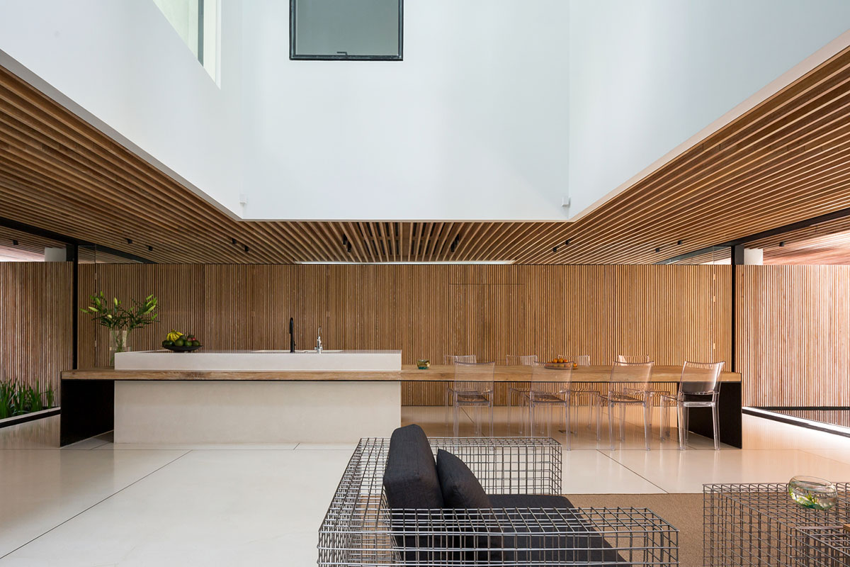 MIA Design Studio compensates the lack of green spaces of Vietnam with planted pop-up balconies