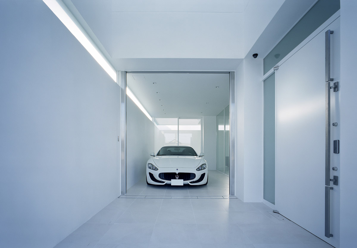 Fujiwaramuro Architects designs family house with thin skylights and transparent built-in garage