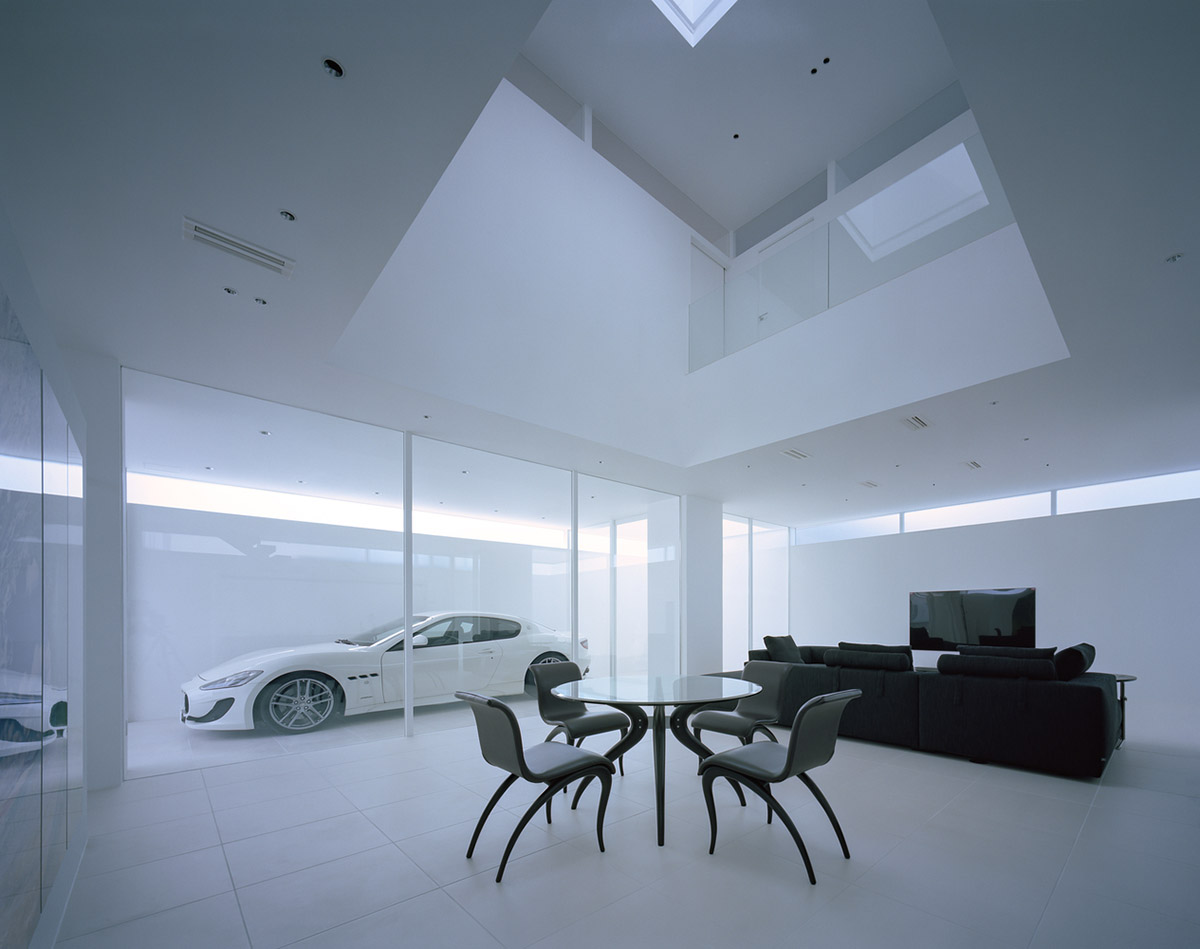 Fujiwaramuro Architects designs family house with thin skylights and transparent built-in garage