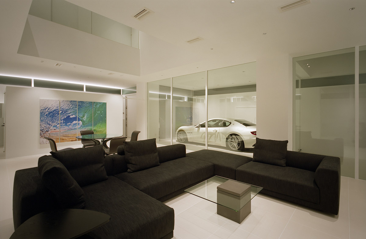 Fujiwaramuro Architects designs family house with thin skylights and transparent built-in garage