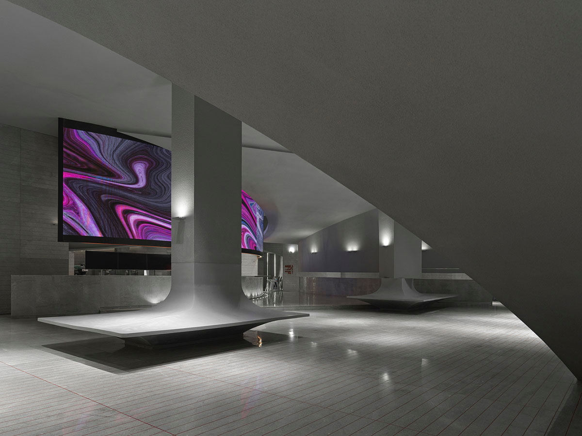 Greyscale interior provides acoustically comfortable space for a cinema by One Plus Partnership