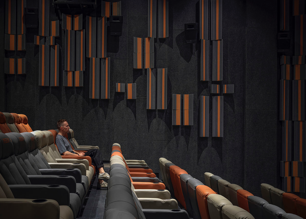 Greyscale interior provides acoustically comfortable space for a cinema by One Plus Partnership