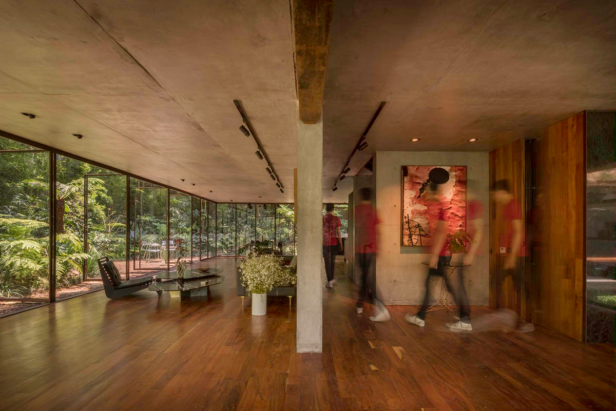 Triangular and faceted green terraces provide generous open spaces for this residence by Vertebral