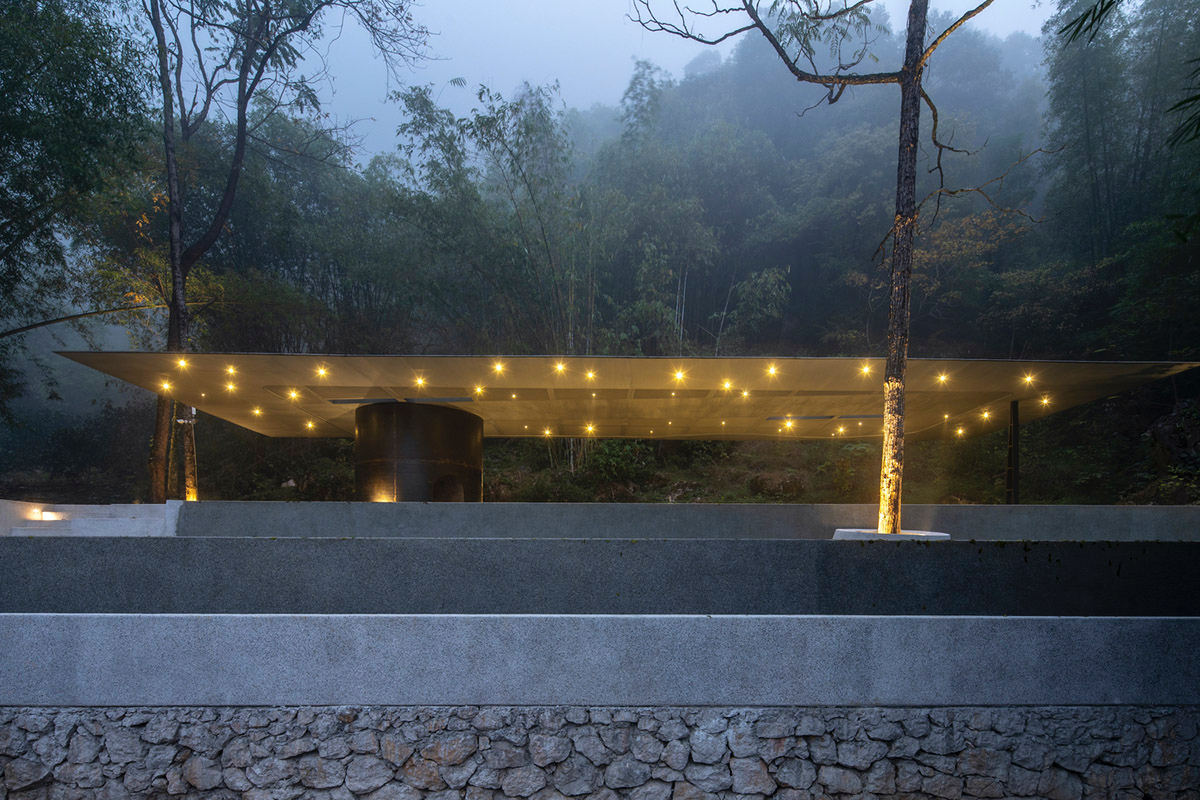 Atelier Liu Yuyang Architects built glassless yoga pavilion featuring silver roof set on a hill