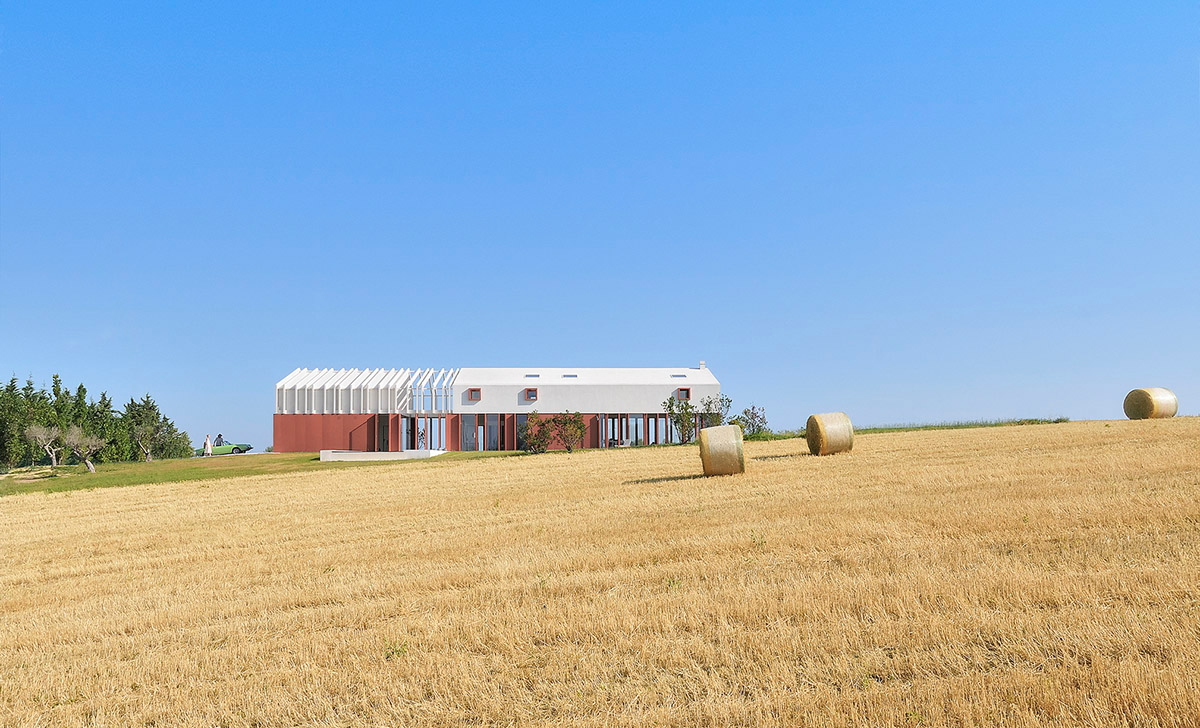 White and reddish strips are used to create cinematic appearance for Border Crossing House in Italy