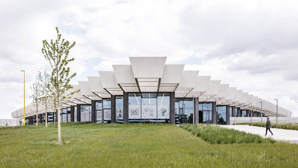 COBE creates giant rhomboid roof for Adidas' new headquarters in Germany