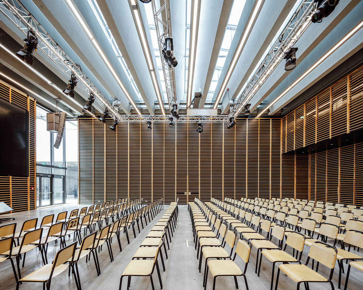 COBE creates giant rhomboid roof for Adidas' new headquarters in Germany