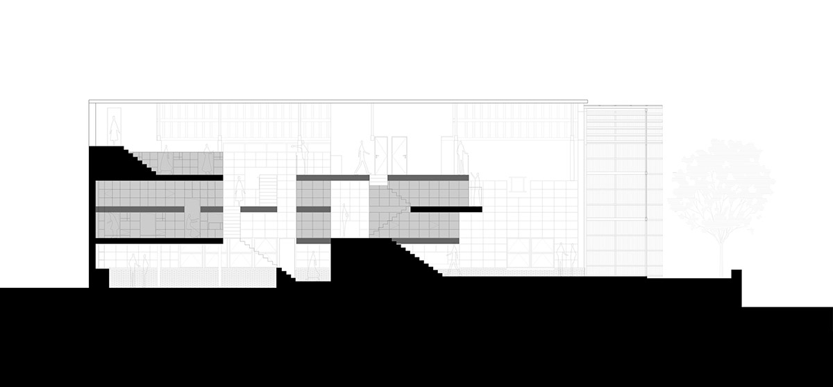 Atelier tao+c converts old building into capsule hotel with corrugated polycarbonate panels in China