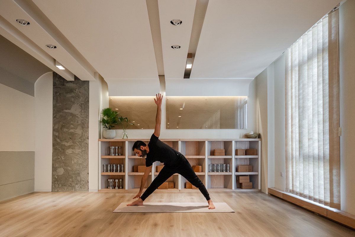 Minimal and rich color palette embrace diversity in this interior for a yoga studio in Kuwait