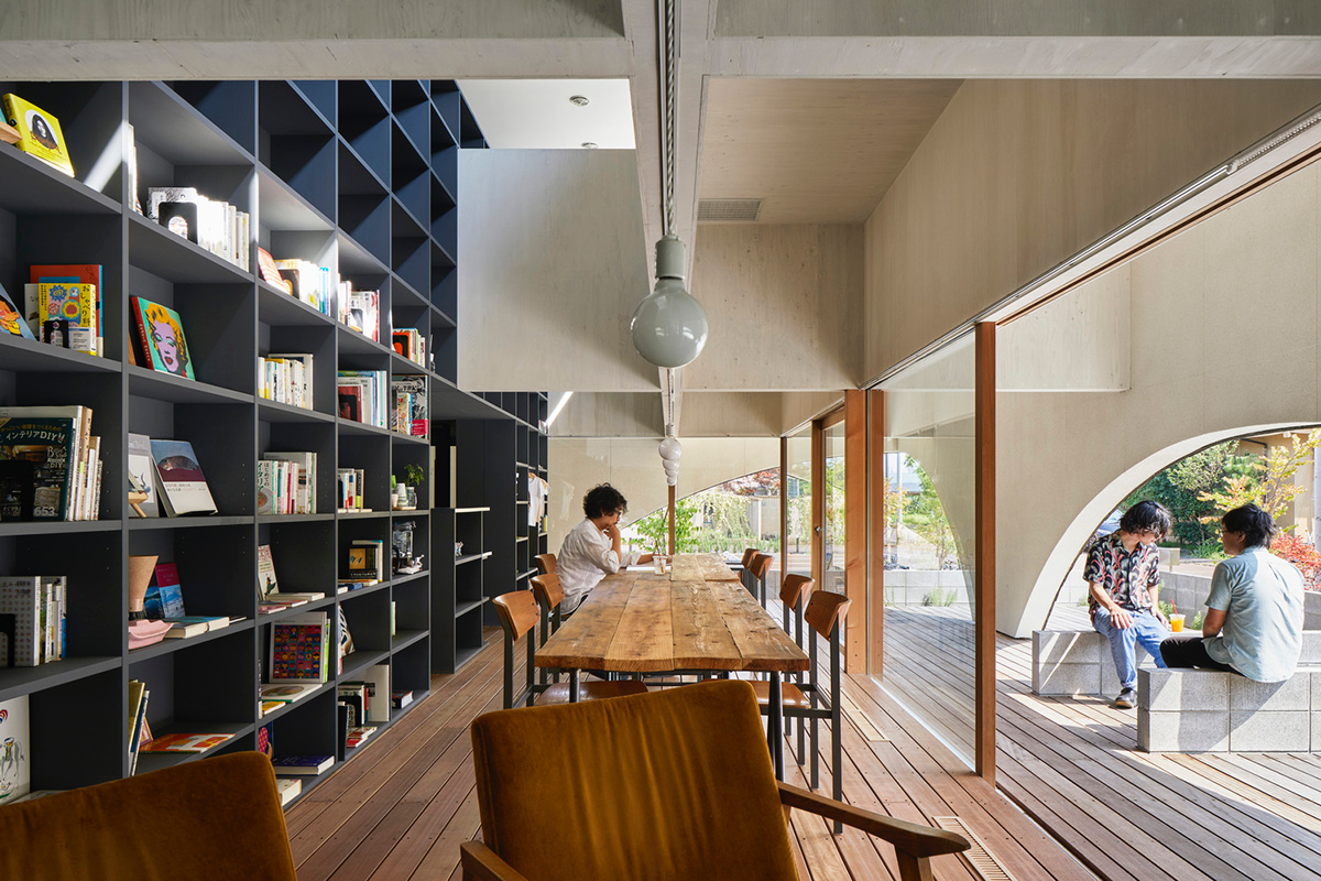 A dental clinic and daycare center are hidden under arches in Japan by Takeru Shoji Architects