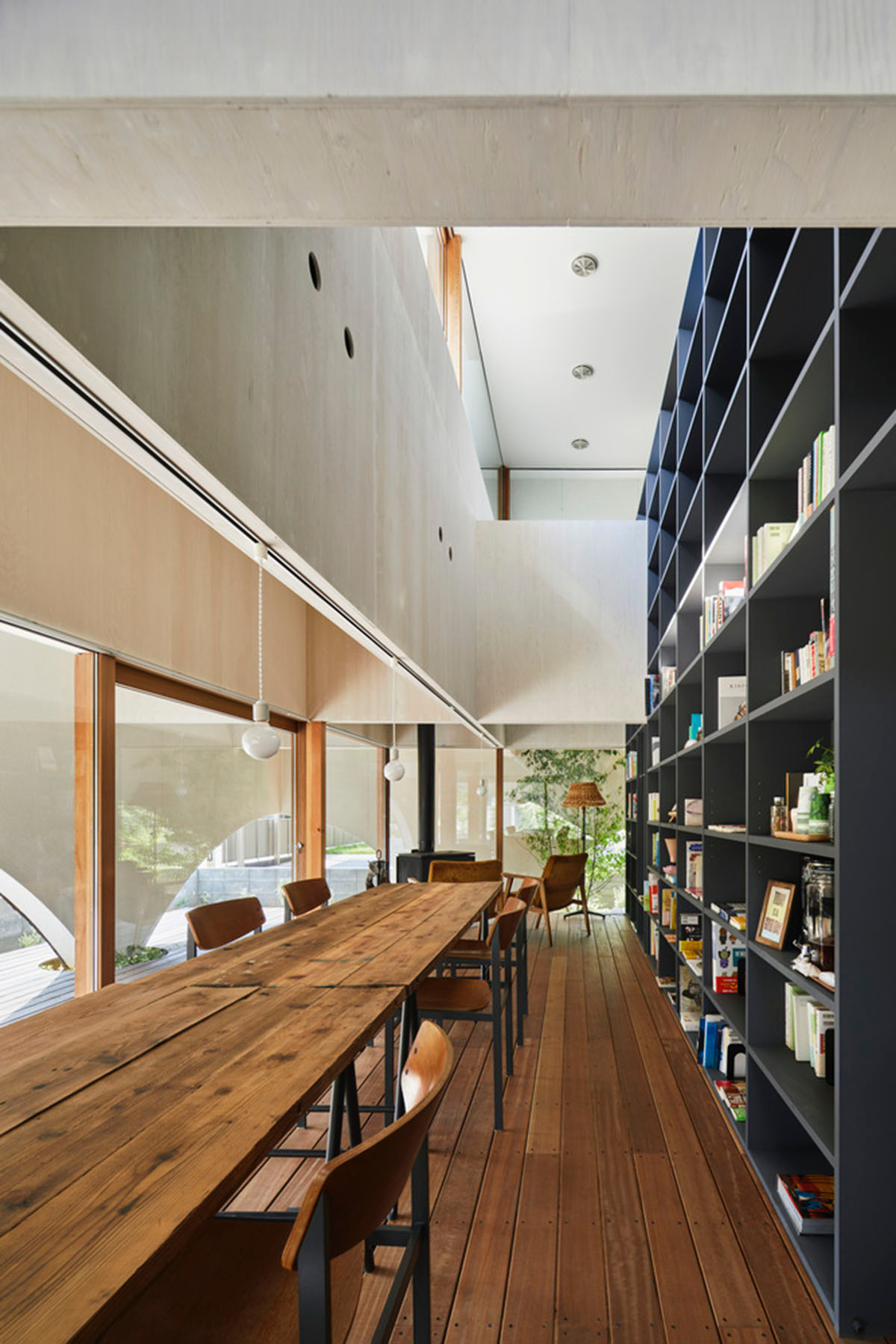 A dental clinic and daycare center are hidden under arches in Japan by Takeru Shoji Architects