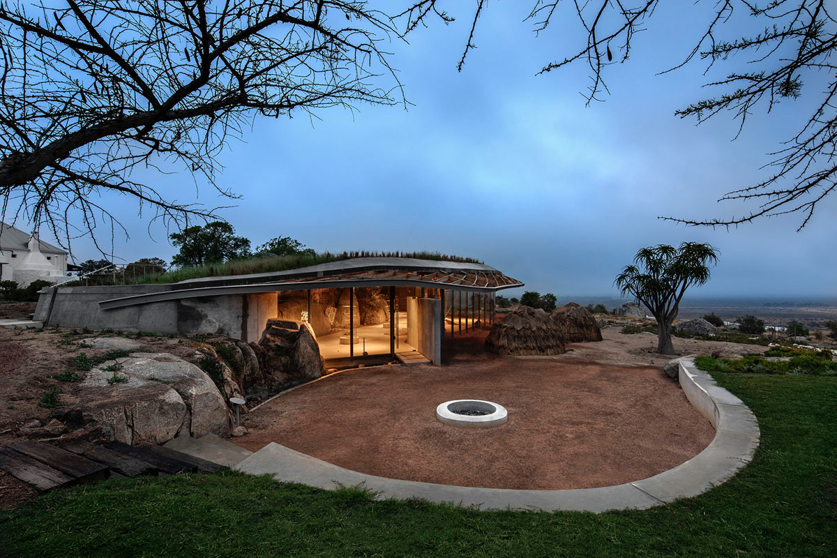 KLG Architects completes heritage center with undulating roof that acts as a small shelter