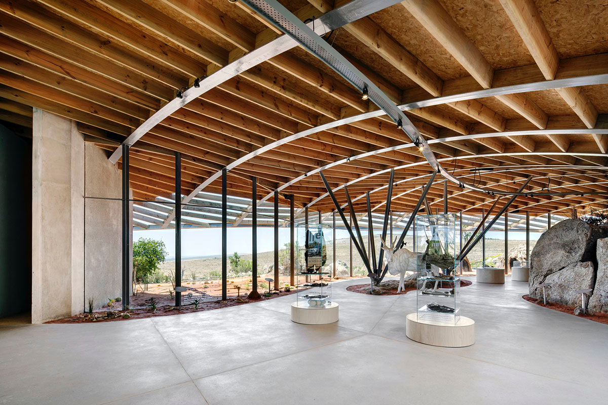 KLG Architects completes heritage center with undulating roof that acts as a small shelter