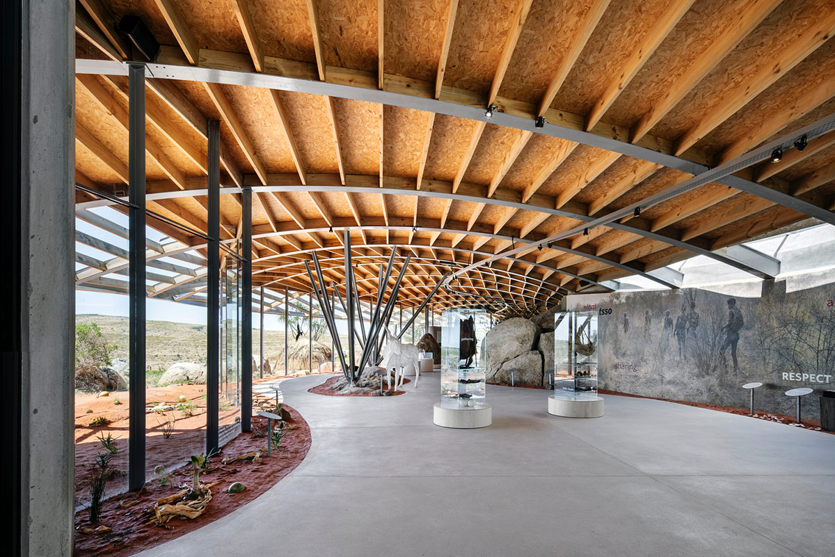 KLG Architects completes heritage center with undulating roof that acts as a small shelter