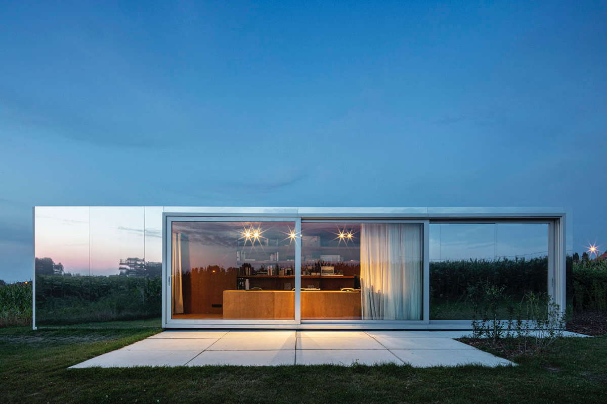 TOOP architectuur uses old shipping containers to convert them into architects' studio in Belgium