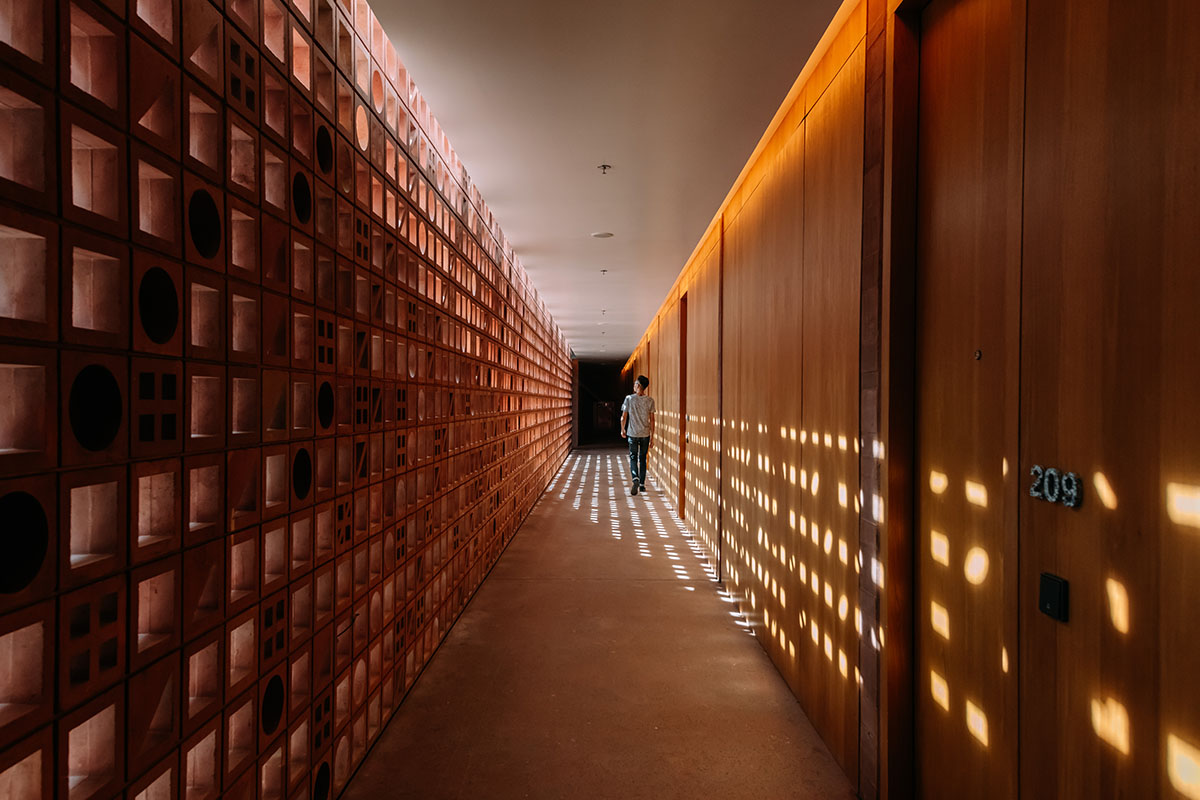 OMA's hotel in Bali is lifted to feature an open platform for daily activities of Balinese people