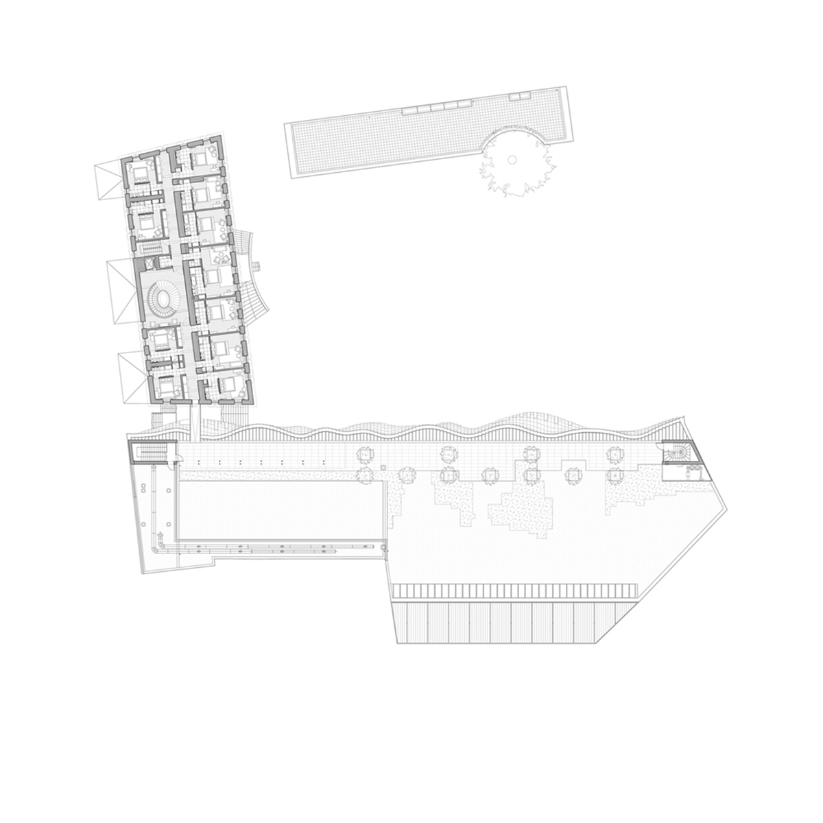 Curving stone solid walls form this winery and guide visitors for winemaking process in France