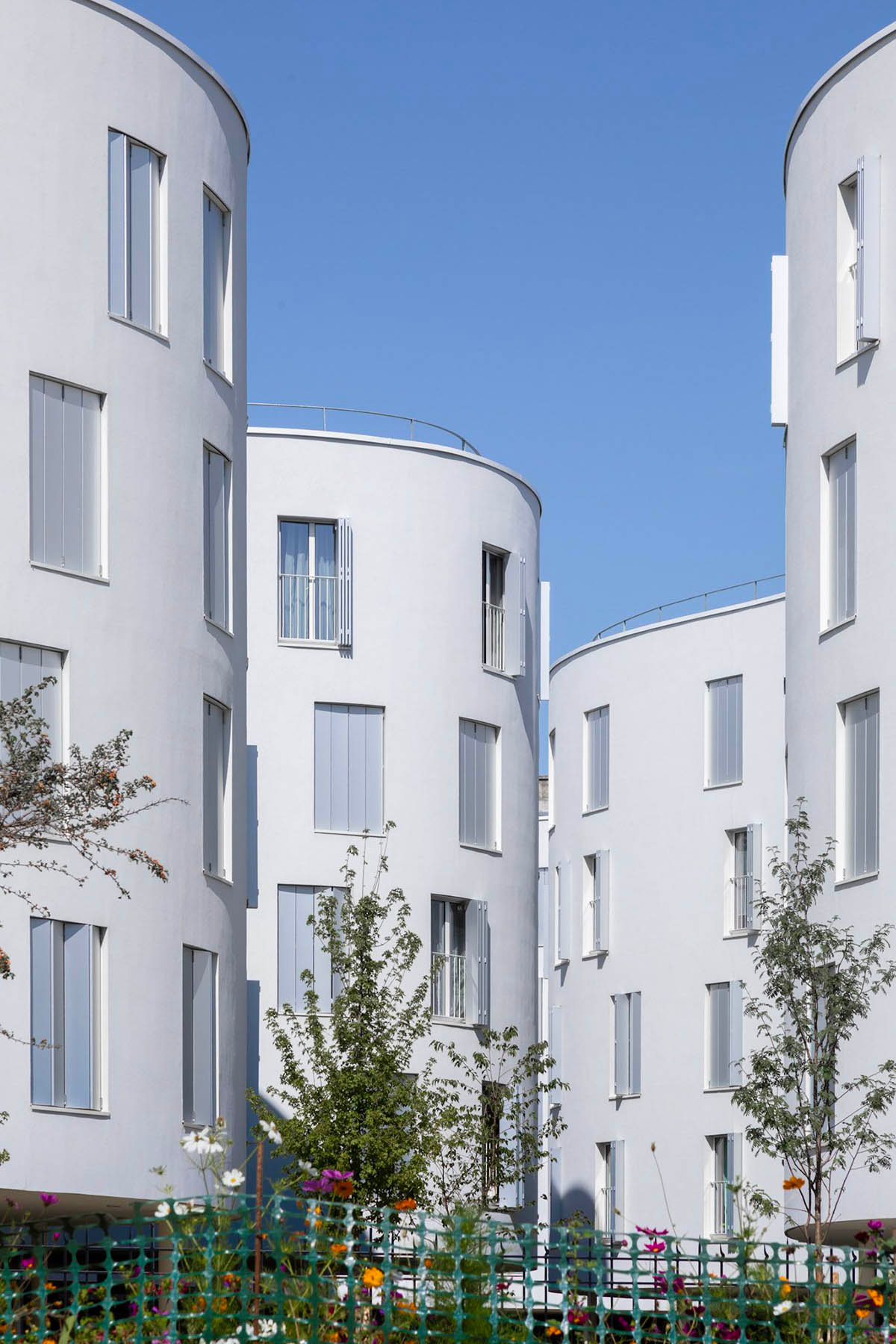 SANAA's social housing complex composed of organic forms in Paris photographed by Vincent Hecht