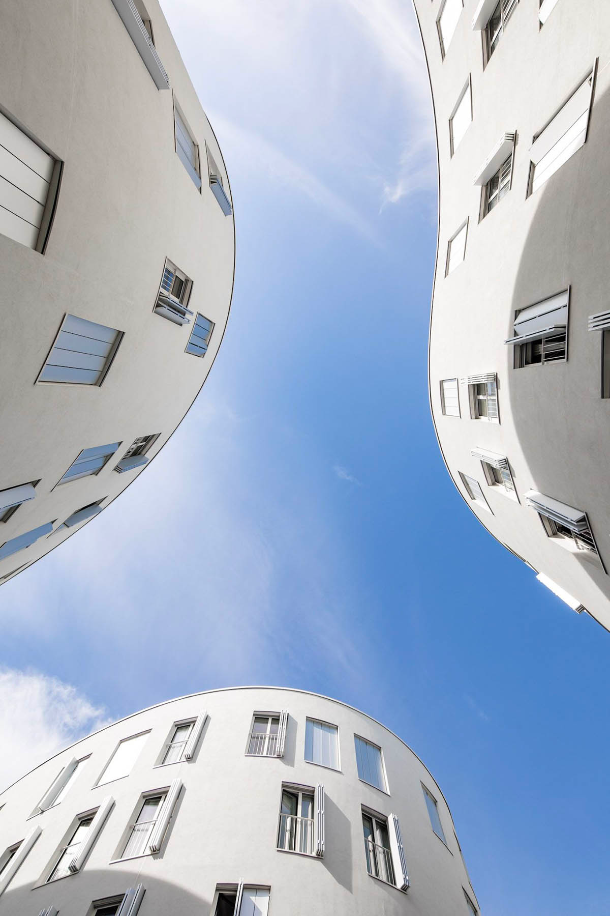 SANAA's social housing complex composed of organic forms in Paris photographed by Vincent Hecht
