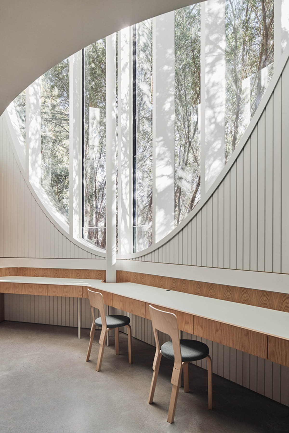 Chenchow Little Architects creates arched cut-outs for residence referencing to old Victorian houses