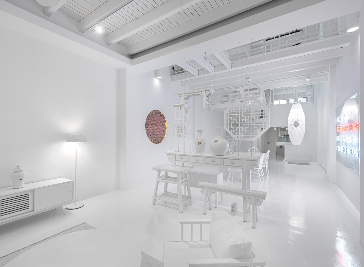 Ministry of Design transforms old dwelling in Singapore into co-living house with all-white interiors