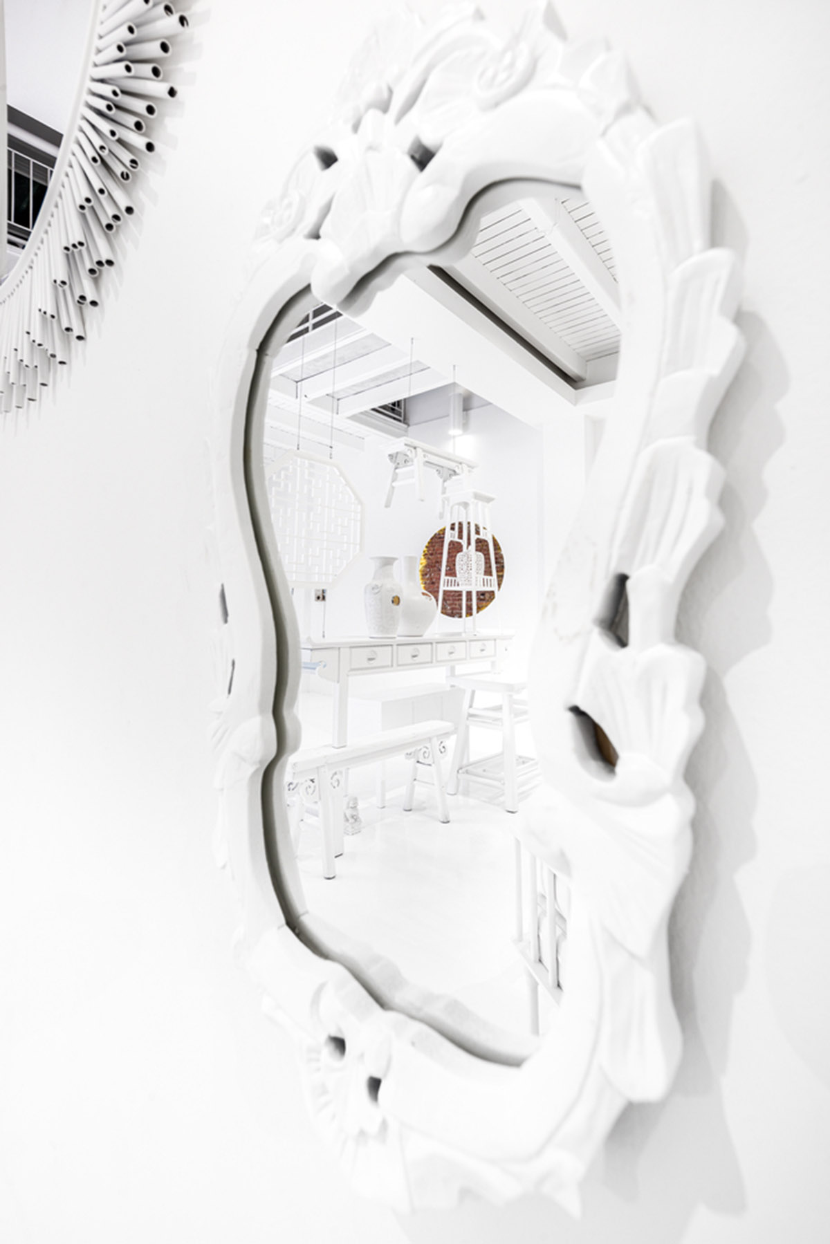 Ministry of Design transforms old dwelling in Singapore into co-living house with all-white interiors