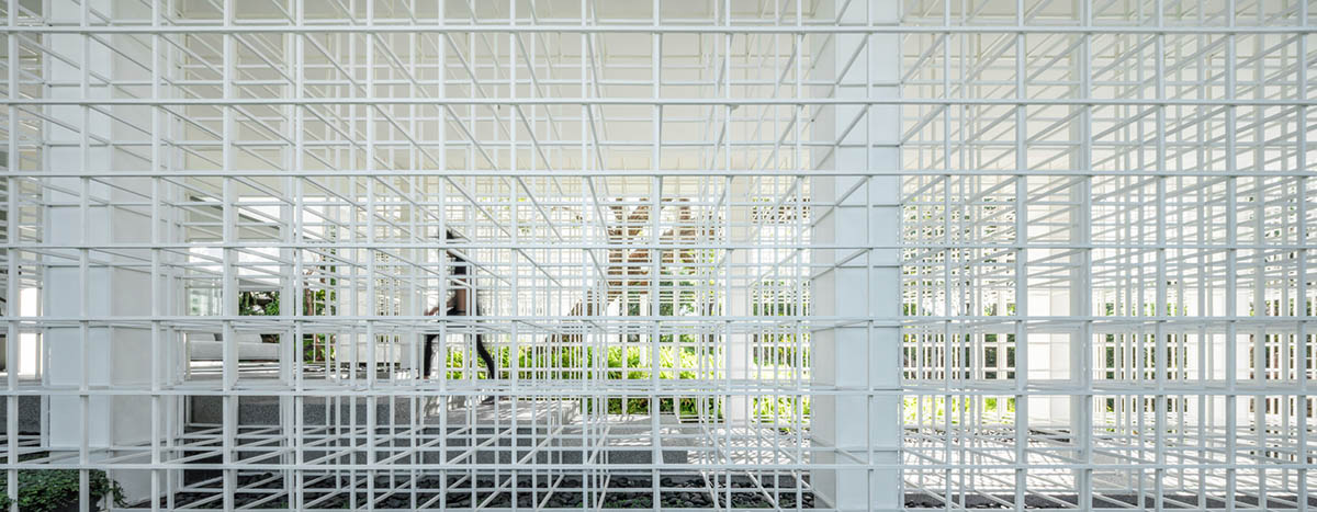 AAd built self-sustainable residence with perforated facade and steel rods in Thailand