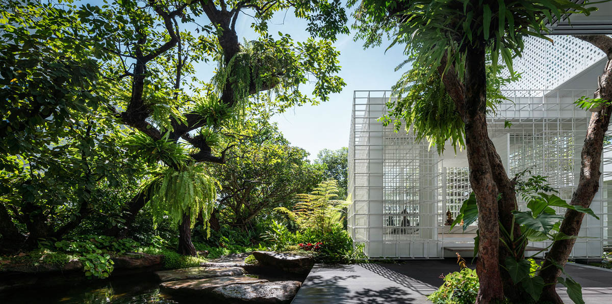 AAd built self-sustainable residence with perforated facade and steel rods in Thailand