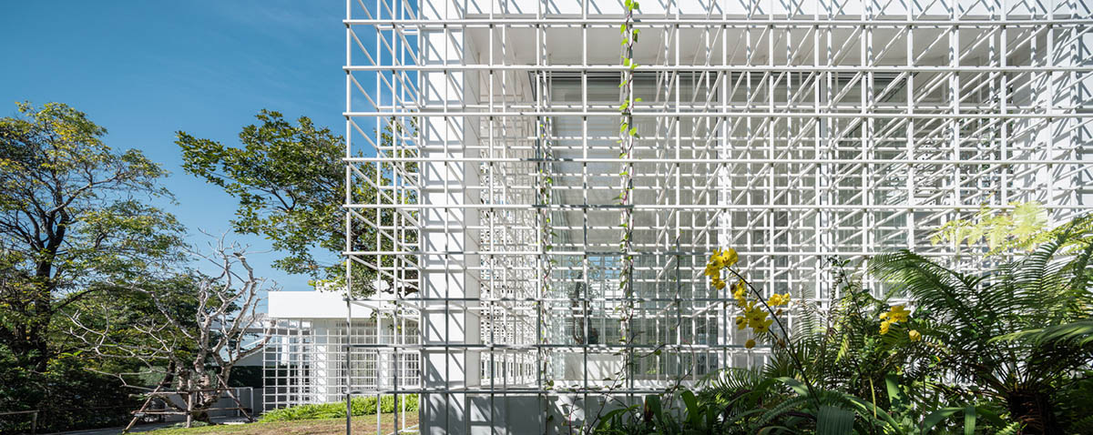AAd built self-sustainable residence with perforated facade and steel rods in Thailand